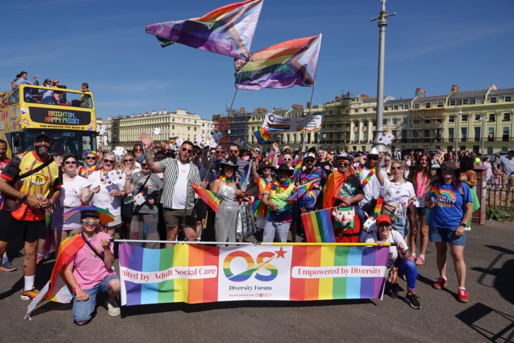 A group of people marching in Brighton Pride 2026